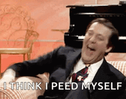 Hysterical Laughing Slapping Couch GIF
