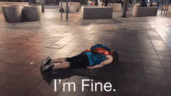 I'm Fine Lay On The City Street GIF