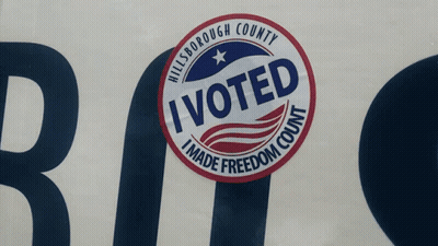 I Voted Sticker On A Bus GIF