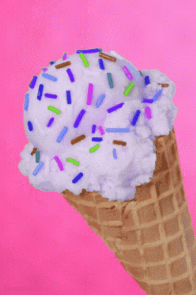 Ice Cream Cone With White Ice Cream And Sprinkles GIF