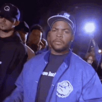 Ice Cube In Blue Jacket And Hat Before Crowd GIF