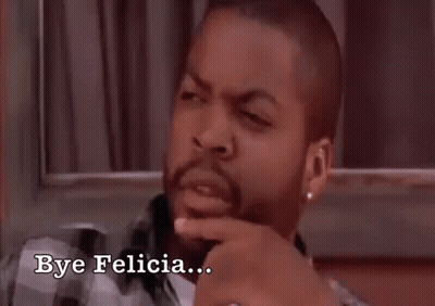 Ice Cube Is Sitting In Front Of A Window With His Hand On His Chin . GIF