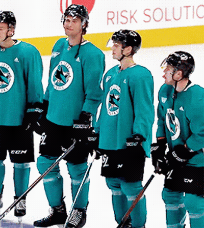 Ice Hockey Players With Risk Solution Sign GIF