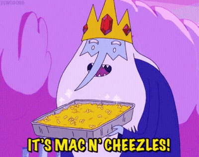 Ice King From Adventure Time Is Holding A Tray Of Mac N Cheezles GIF