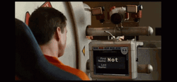 Idiocracy Luke Seating While Looking On The Screen GIF