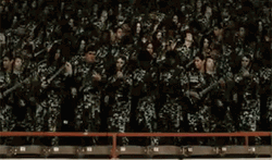 Idiocracy Soldiers Dancing While Holding Ripples GIF