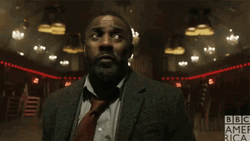Idris Elba Pointed By A Gun GIF