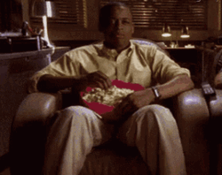 Im Sat Eating Popcorn GIF