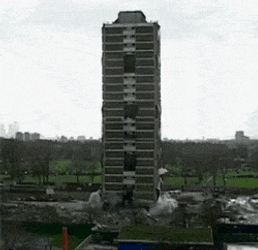 Implosion Of Building Like Jenga Game GIF