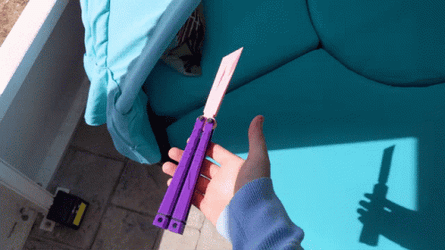Impressive Violet Butterfly Knife Technique GIF
