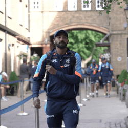 India Cricket Player Walking On Street GIF