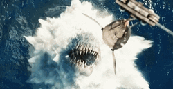 Indoraptor Trying To Eat Hanging Fish GIF