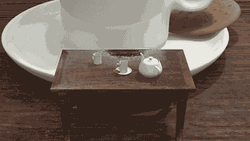 Infinite Tea Cup And Kettle On Table GIF