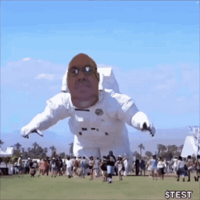 Inflatable Astronaut With Man's Face Flying GIF