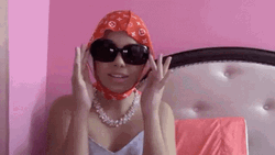 Influencer Showing Her Glasses  GIF