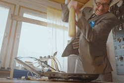 Infuriated Man Smashing Computer With Bat GIF