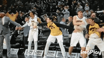 Iowa Basketball Players Dancing On Court GIF