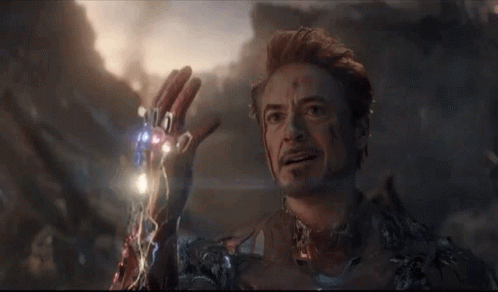 Iron Man Is Holding The Infinity Gauntlet In His Hand In The Endgame . GIF