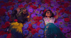 Isabela And Mirabel Chilling Flower Bed Encanto GIF