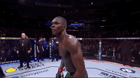 Israel Adesanya Bowing To The Audience GIF