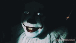 It Is Smiling From The Dark GIF