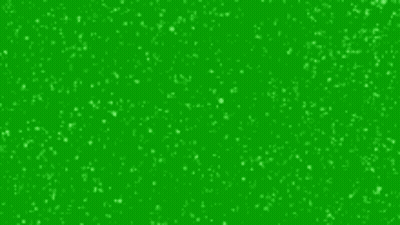 It Looks Like Snow Is Falling On A Green Background . GIF