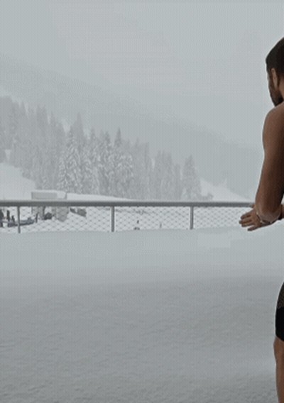 It's Coming Poster With Snow Falling GIF
