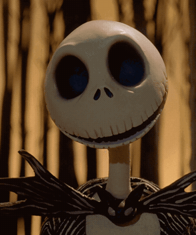 Jack Skellington From The Nightmare Before Christmas Is Smiling And Looking At The Camera GIF