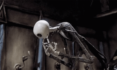 Jack Skellington Standing In Dark Room With Mouth Open GIF
