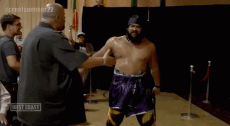 Jacob Fatu Placing Wrestling Belt On Shoulder GIF