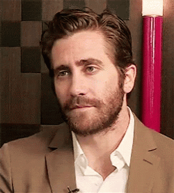 Jake Gyllenhaal Serious Stare Wink GIF