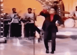James Brown Doing A Funny Dance While Smiling GIF