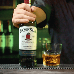 Jameson Whiskey Bottle With Glass On The Side GIF