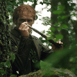  Jamie Fraser Spying With Binoculars GIF