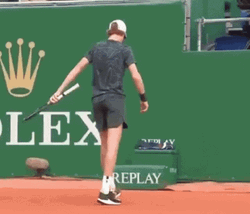 Jannik Sinner Tennis Court Rolex Logo GIF