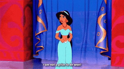Jasmine From Aladdin Talking In Front Of Blue Curtain GIF