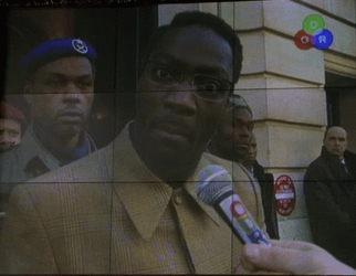 Jason Bourne Wombosi Talking On Microphone GIF