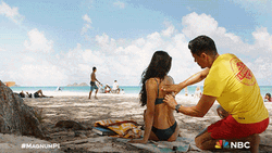 Jay Hernandez Rubbing Lotion On Sexy Woman GIF