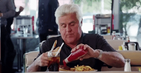 Jay Leno Putting Ketchup On Food  GIF