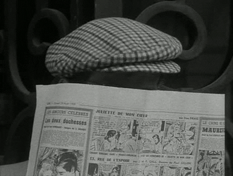 Jean-Luc Godard Spy Through Newspaper GIF