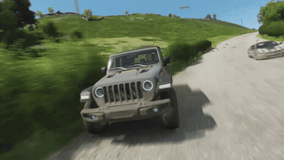 Jeep Driving Down Dirt Road Next To Sports Car GIF