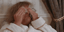 Jeff Daniels Money Bags Wiping Dollar Bills GIF