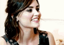 Jenna Coleman Shaking Her Hair GIF