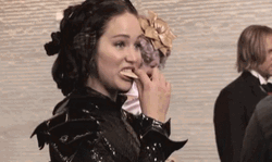 Jennifer Lawrence Eating On Hunger Games Set GIF