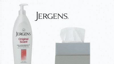 Jergens Original Scent Bottle Next To Tissue Box GIF