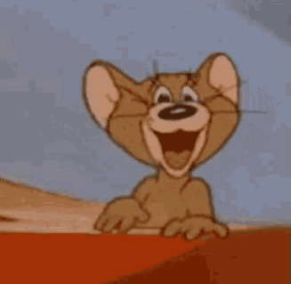 Jerry From Tom And Jerry Is Smiling And Pointing At The Camera . GIF