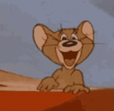 Jerry From Tom And Jerry Is Smiling And Pointing His Finger . GIF