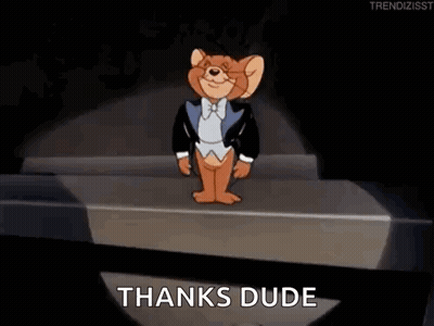 Jerry From Tom And Jerry Is Wearing A Tuxedo And Bow Tie And Is Standing On A Stage . GIF