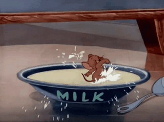 Jerry Mouse Swimming In Bowl Of Milk GIF