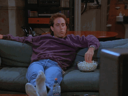 Jerry Seinfeld Cheering While Eating Popcorn Meme GIF